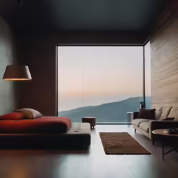 this bedroom has two couches, a chaise lounge and a window overlooking the mountains