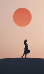 a person walking down the hill with a basket