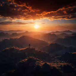 a person is standing on top of the hill