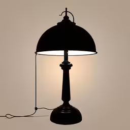 a lamp that is sitting next to a table