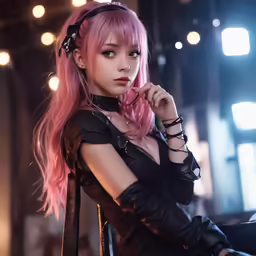 a woman with pink hair sitting in front of microphone