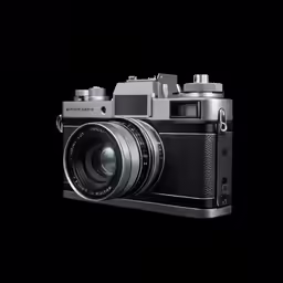 an old camera is on display in front of a black background
