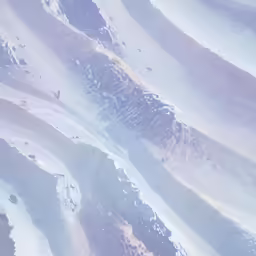 the blue and white water is swirled upwards