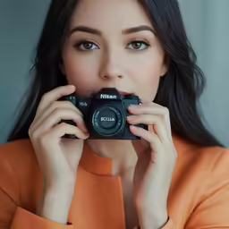 a woman taking a picture with her camera