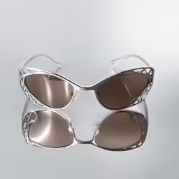 pair of sunglasses lying on top of table
