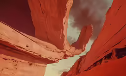 an unusual view of some rocks that are red