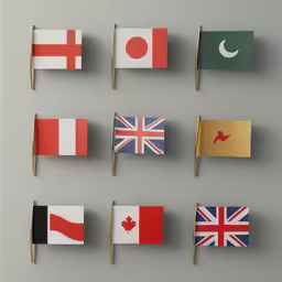 miniature flags are hanging on a clothesline against a gray background