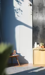 an open room with a table and a plant