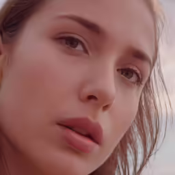 the portrait of a young woman on a beach