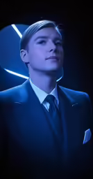 a young man in a suit looks up at the sky