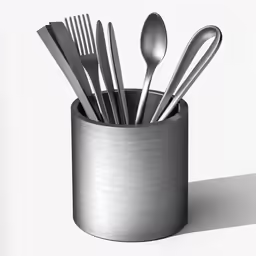 an image of spoons and forks in a cup