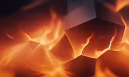 a bright red fire burning into a wall
