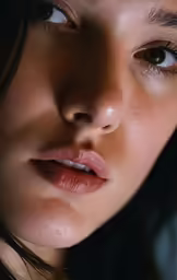 a beautiful woman looking away with a concerned look