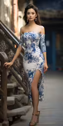 a woman in a white and blue dress poses for the camera,a woman in an off the shoulder dress and heels