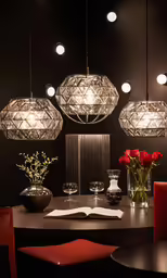 modern hanging lights over a modern dining room table