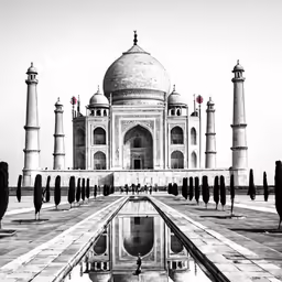 the tajwaf, or humayi mosque, reflecting in a pool