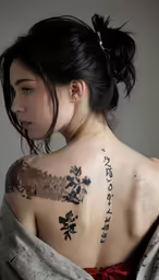 a girl with a back tattoo that is all done