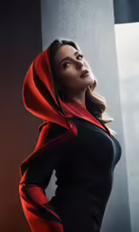 the woman with red scarf on top of her head