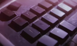 a close up of an old computer keyboard