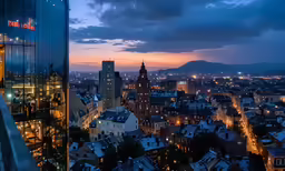 the city at night with the sky and clouds