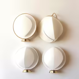 three porcelain plates mounted to the wall