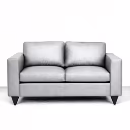 a gray couch against a white background
