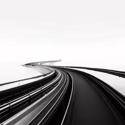 the view of a highway with train tracks that meet each other