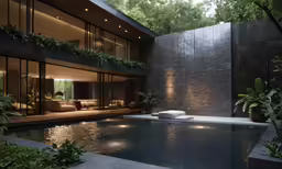 a pool in front of an elegant home