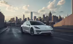 the front of the car is white, and sits in front of a city background