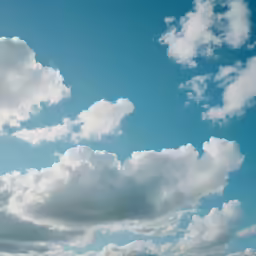 several jets flying high in the sky together