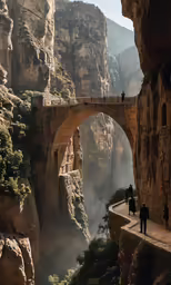 a man is standing on the bridge over the river