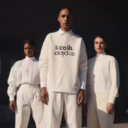 a couple of people standing next to each other