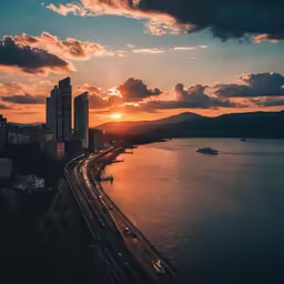 a view of sunset over the ocean from high above