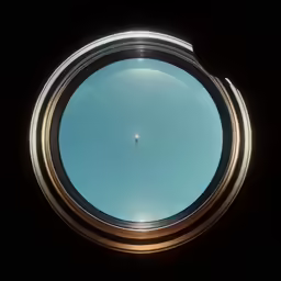 the view of a blue sky through an old window