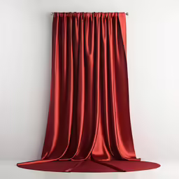 a red curtain sits up against the wall