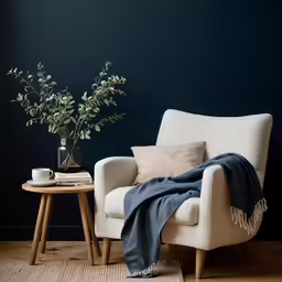 a living room with a chair and vase of flowers