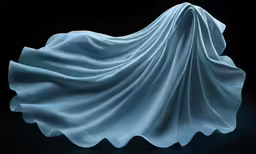 a long white drape draped over an object