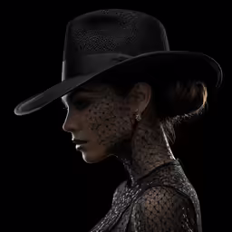 a woman wearing black clothing and a hat