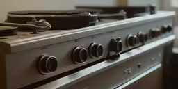 a stove with two burners and a plate on top of it