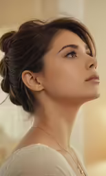 a woman with a white dress standing with her eyes closed