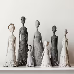 a bunch of mannequins that are standing next to each other