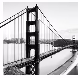 the golden gate bridge is shown in black and white
