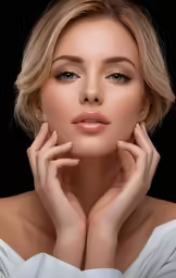 a model posing in a white dress