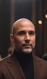 a bald man with a shaved head