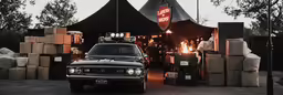 there is a truck that is being driven out of the tent