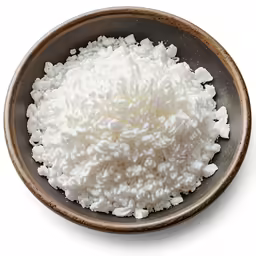 a bowl of white rice with some powdered bits