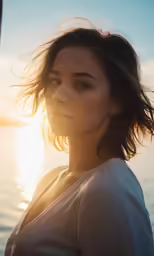 the woman looks to the side while in the water