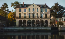 there is a building that has people outside on it