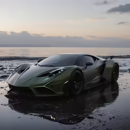 a luxury car is on the beach and in the distance water