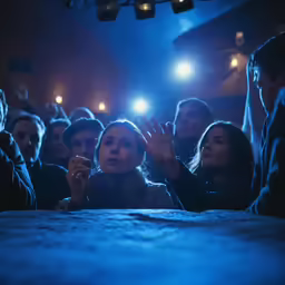 a group of people that are sitting down in a theater